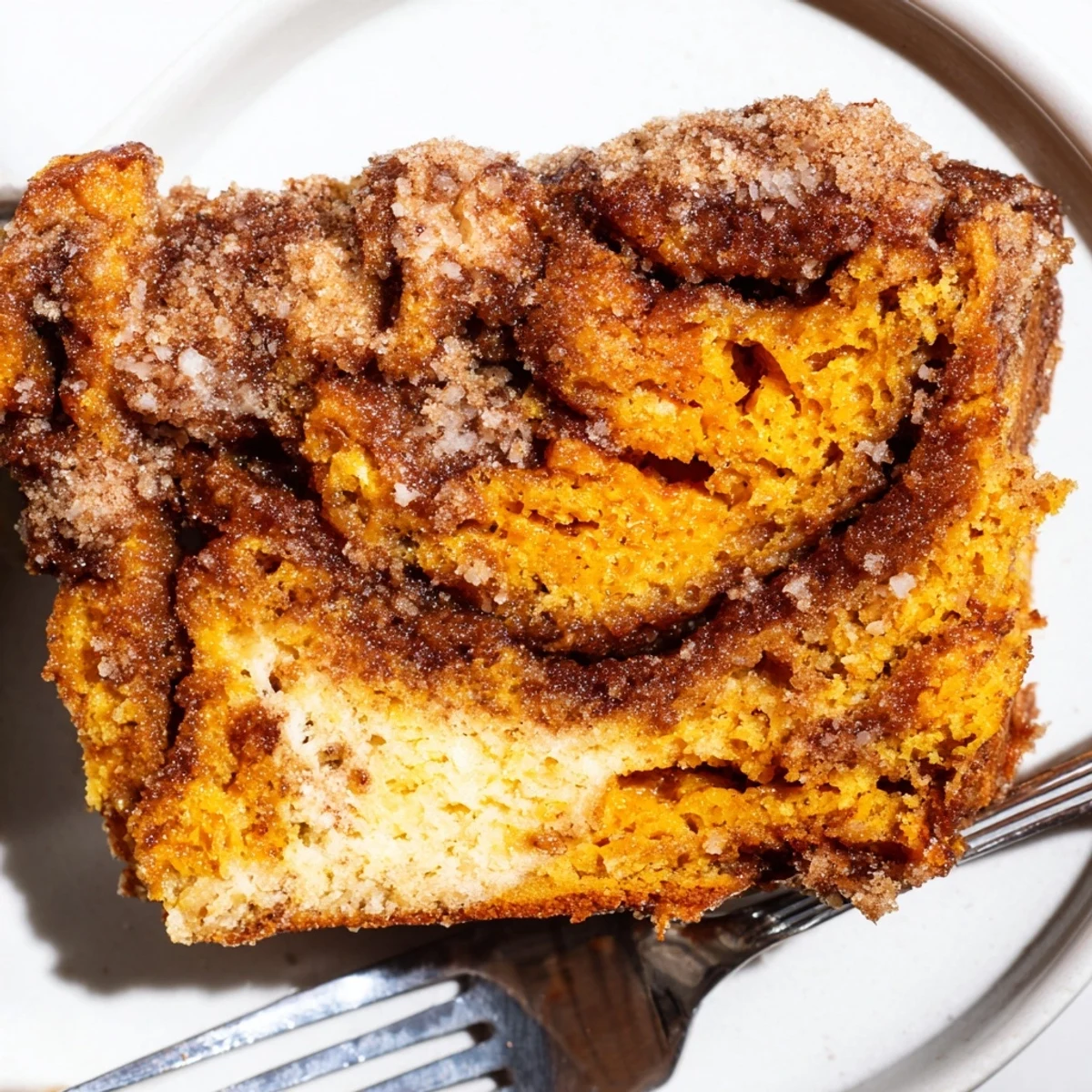 Golden Churro Sweet Potato Chaos Bread with cinnamon-sugar topping, perfect for dessert.