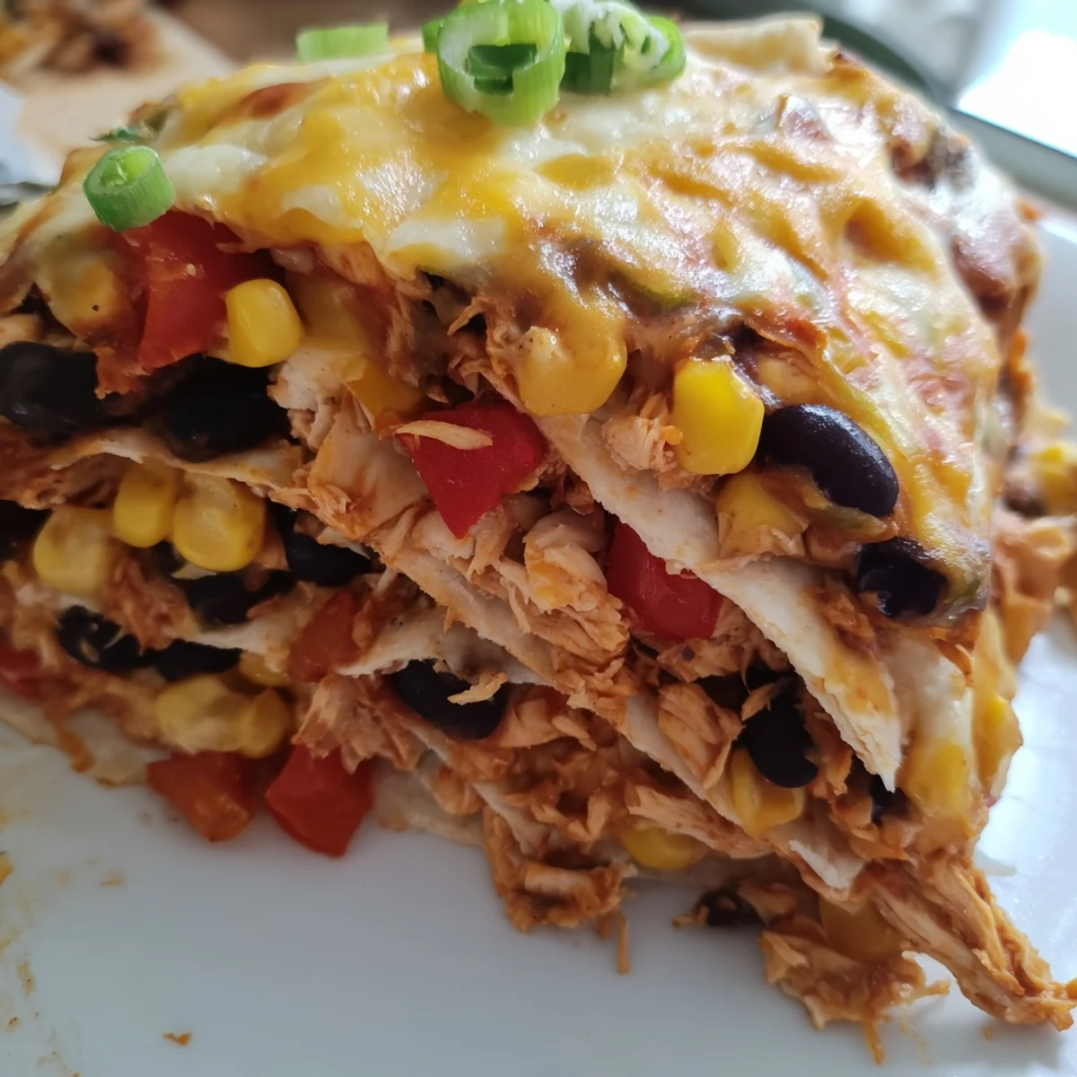A close-up view of a cheesy, comforting Taco Bell Copycat Chicken Bake, ready to serve and enjoy.