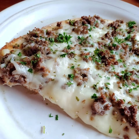 Ground Beef Alfredo Pizza, oozing with melted mozzarella, a family favorite meal.