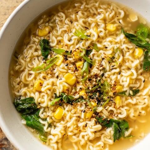 Silky ribbons of egg swirl in this flavorful Elevated Ramen Egg Drop Soup, ready to slurp.
