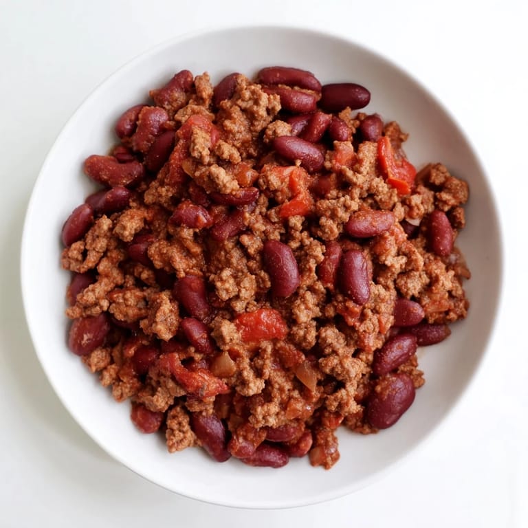 This vibrantly red 4-Ingredient slow cooker chili looks perfect—a quick and flavorful meal ahead.