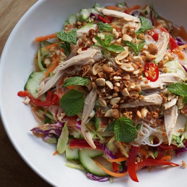 Enjoy the flavors of this Vietnamese Crunch Noodle Salad with Shredded Chicken, a light and satisfying meal.
